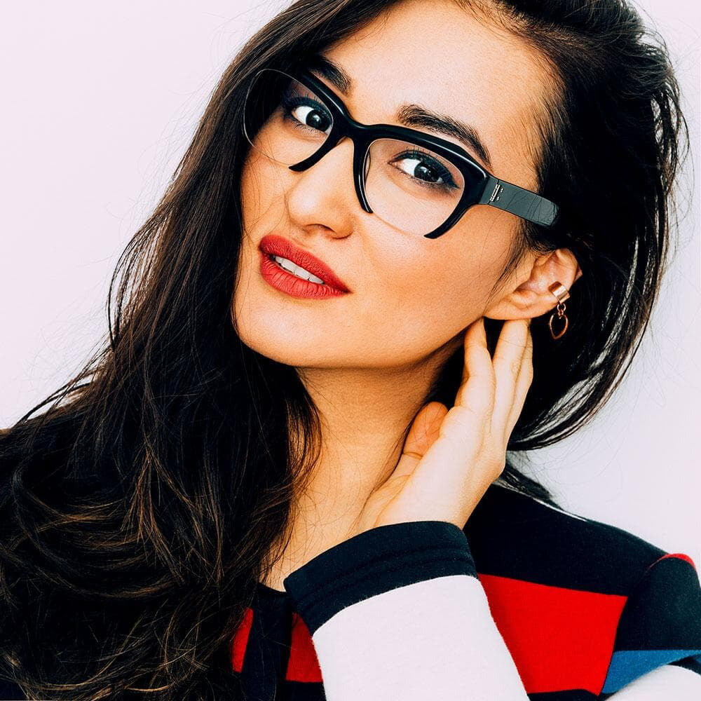 A woman wearing prescription glasses